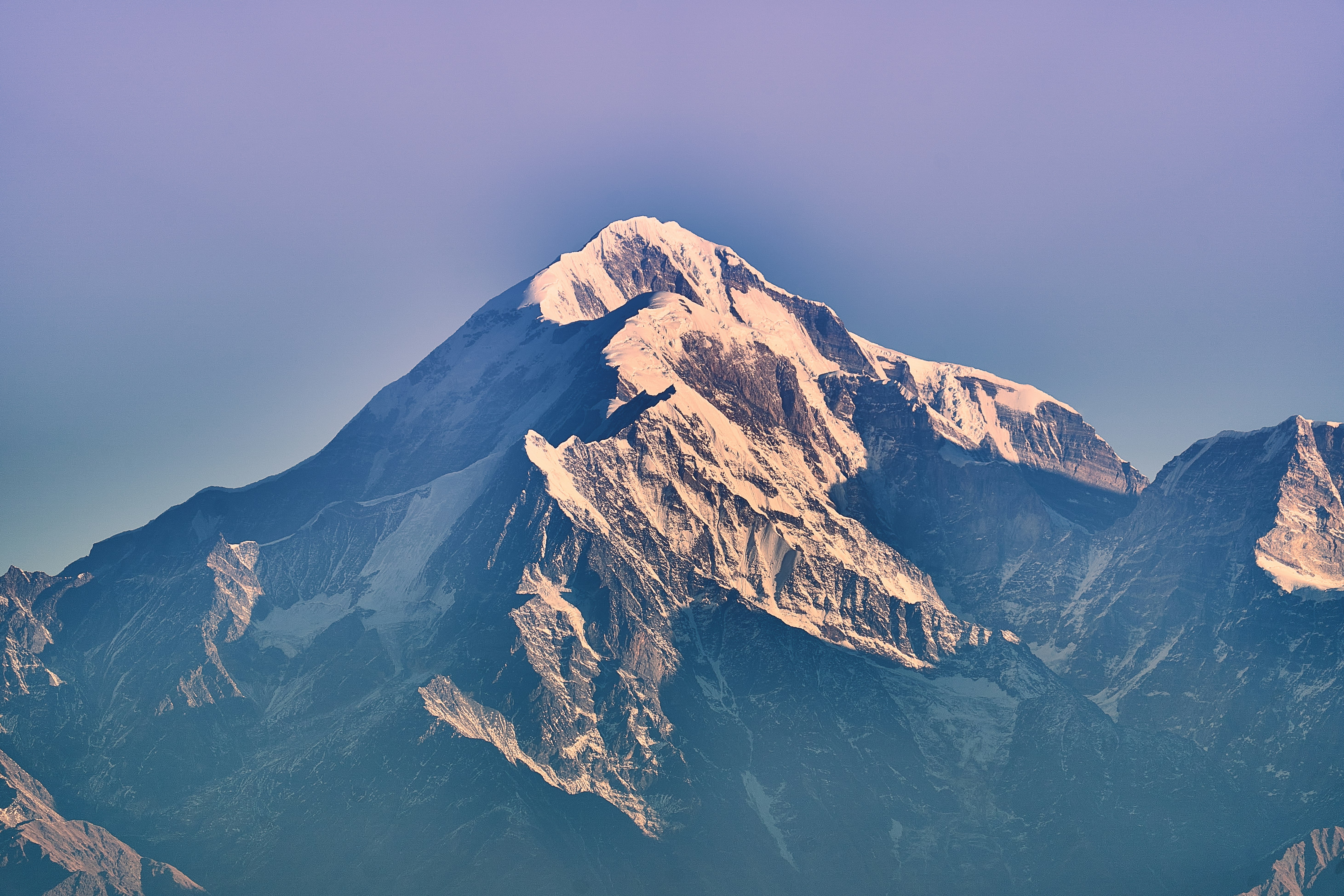 brown and white mountain under blue sky during daytime